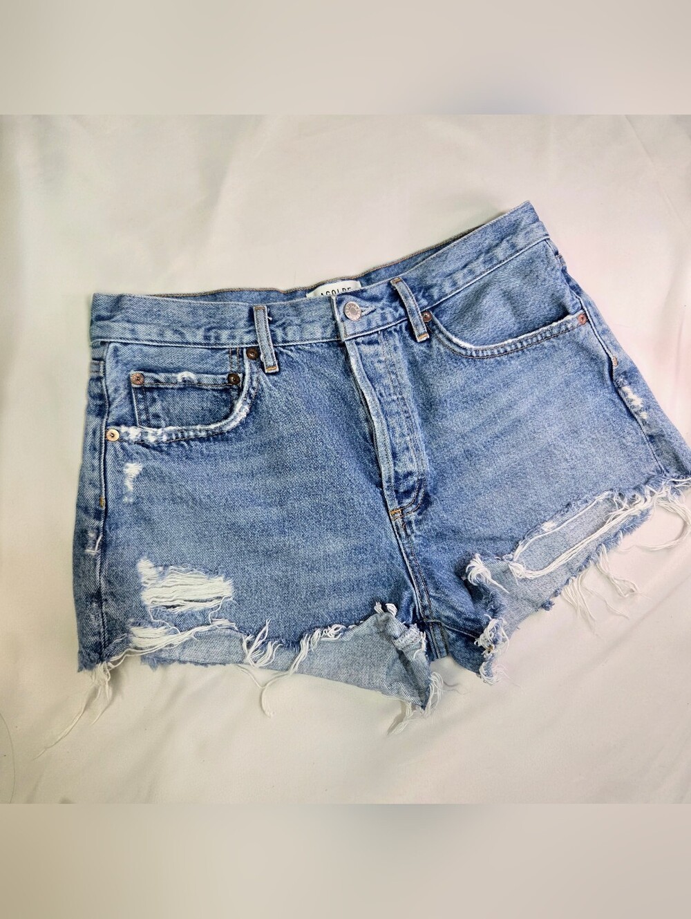 Agolde Light Blue Distressed Denim Cutoff Shorts